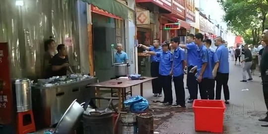执法劝阻被泼热油,执法劝阻被泼热油 店主为何这样狠心对城管